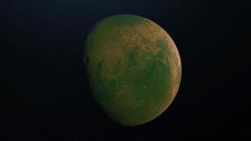 Abstract animation of surface of green planet. Animation. Green planet with crater surface and irregularities rotates on background of stellar space video