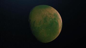 Abstract animation of surface of green planet. Animation. Green planet with crater surface and irregularities rotates on background of stellar space video