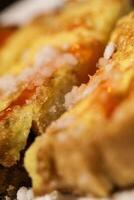 a close up of a piece of french toast photo