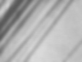 White Stucco Wall with Shadow and Light Beam on Surface, Suitable for Making Blur to multiply and overlay on Product Presentation. photo