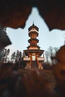 Roznov wooden lookout tower on the jewels of Beskydy mountains in the Czech Republic during sunset photo