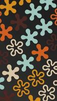 Vertical video - trendy 1970s retro floral design pattern motion background animation. This vintage styled background with colorful flower shapes in warm colors is a HD loop.