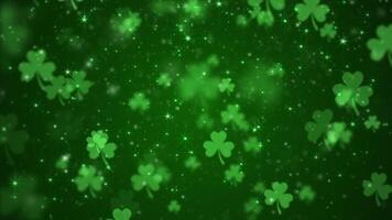 Lucky shamrocks, shiny stars and glowing glittering particles on a dark green gradient background. This Saint Patrick's Day celebration party background animation is full HD and a seamless loop. video