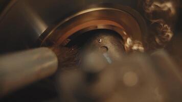 Production of rings. Jeweler working with wax model ring in his workshop. Craft jewelery making. Detail shot with low depth of field. Jeweler making handmade jewelry on vintage workbench. Craft of video