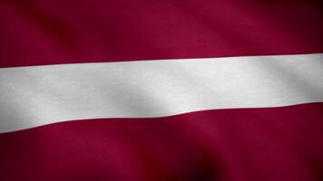 Latvia flag waving in the wind. Background with rough textile texture. Flag of Latvia, waving video