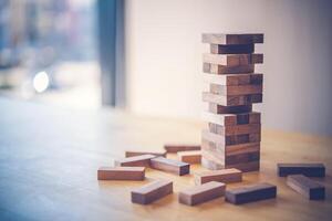 Business risks in the business. Requires planning Meditation must be careful in deciding to reduce the risk in the business. As the game drew to a wooden block from the tower photo