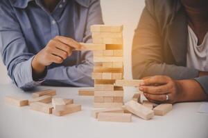 Business risks in the business. Requires planning Meditation must be careful in deciding to reduce the risk in the business. As the game drew to a wooden block from the tower photo