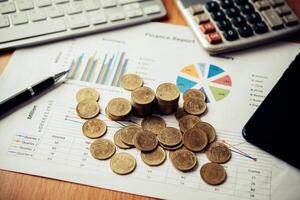 Coins stacked on graph paper. Business Concept of business photo