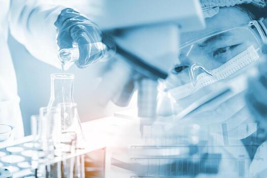 Scientists hold in vitro experiments with scientific instruments and laboratory microscope. - Experimental concept of research and development in medicine photo