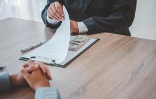businessman was negotiating a bribery arrangement in which the dollar would be accepted as a bribe. Concepts of anti-bribery and anti-corruption photo