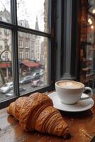 AI generated A cup of cappuccino with a croissant on the table. photo