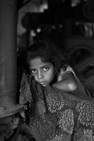 AI generated Portrait of an Asian girl at work. Child labor. Black and white photo