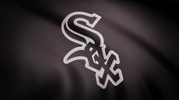 USA - NEW YORK, 12 August 2018. Waving flag with Chicago White Sox professional team logo. Close-up of waving flag with Chicago White Sox baseball team logo, seamless loop. Editorial footage video