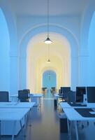 Interior of office with blue walls and arch. photo