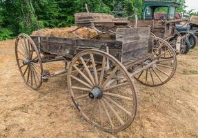 Horse drawn wooden wagon photo
