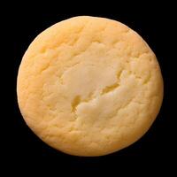 AI generated A classic sugar cookie, characterized by its simplicity and subtle sweetness, features a tender, buttery texture that melts in your mouth, making it a timeless and delightful treat photo