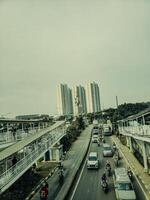 a busy highway with many cars and motorcycles photo