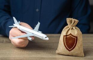 Insurance of air flights, passengers and aircraft. Protection guarantees financial coverage in case of unforeseen events, providing security for both travelers and the aviation industry. photo