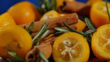 Cake decorated with rosemary, kumquat and gingerbread cookies. Cake decorated kumquat and cinnamon video