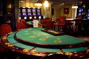 An empty blackjack table in a casino photo