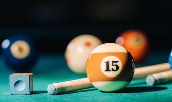 Billiard table with green surface and balls in the billiard club.Pool Game photo