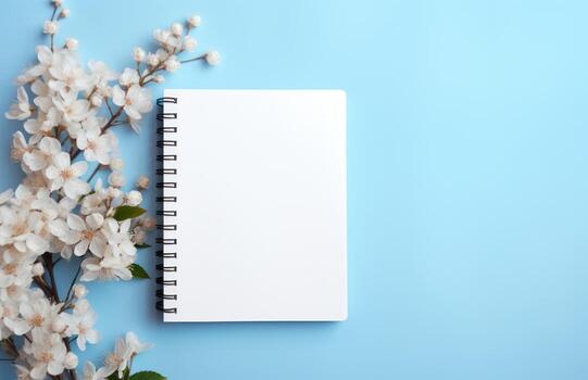 AI generated A blank notebook on a sky blue background placed on a newspaper within an empty box, palm sunday greetings concept photo