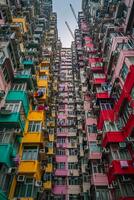 AI generated image captures densely packed, colorful apartment building with balconies. Ai Generated photo