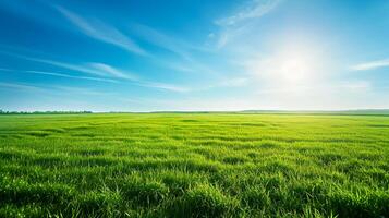 AI generated image of vast, lush green field under bright, clear sky. The grass is vibrant and well lit by the sunlight. In the background with minimal clouds and airy atmosphere Ai Generated photo