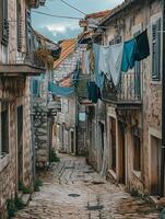 AI generated image captures narrow, winding cobblestone street lined with old buildings and laundry hanging from the balconies Ai Generated photo