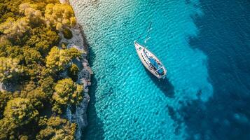 AI generated Aerial drone top down ultra wide photo of luxury yacht anchored in tropical exotic island Ai Generated