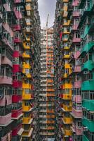 AI generated image captures densely packed, colorful apartment building with balconies. Ai Generated photo