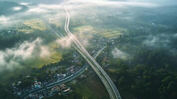 AI generated aerial view captures winding highway cutting through landscape with residential areas, forests, and fields. The highway is prominent, with vehicle visible, Ai Generated photo