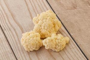 Raw white cauliflower cabbage heap photo