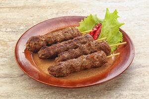 Beef kebab skewer minced meat photo