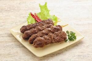 Beef kebab skewer minced meat photo