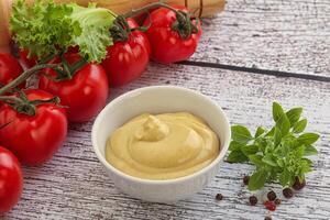 Spicy Mustard sauce in the bowl photo