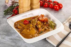 Yellow Thai curry with beef photo