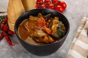 Yellow Thai curry with beef photo