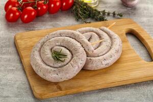 Natural spiral sausage for grill photo