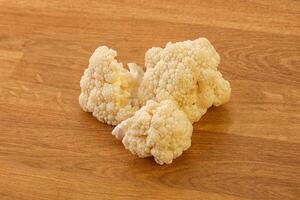 Raw white cauliflower cabbage heap photo