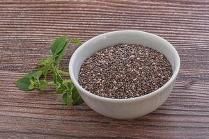 Dietary chia seeds in the bowl photo
