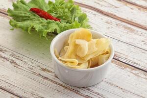 Marinated white ginger in the bowl photo