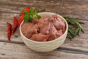 Raw chicken liver in the bowl photo
