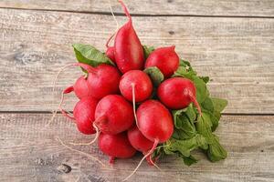 Heap ripe fresh red radish photo