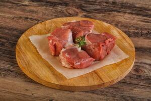 Raw pork tenderloin for cooking photo