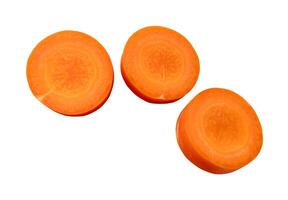 Top view of fresh orange carrot slices in set isolated on white background with clipping path photo