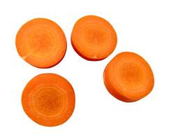 Top view of fresh orange carrot slices in set isolated on white background with clipping path photo