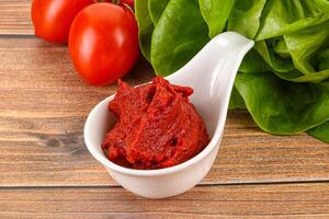 Tomato puree sauce for cooking photo