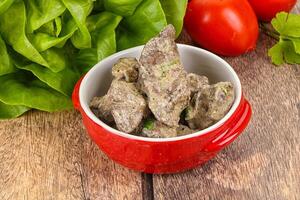 Chicken liver with cream sauce photo