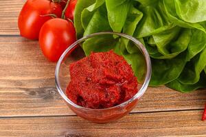 Tomato puree sauce for cooking photo